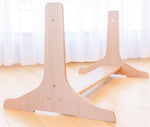 Close up of Beech wood stand for Learn & Grow Toys multi-board sitting on floor 