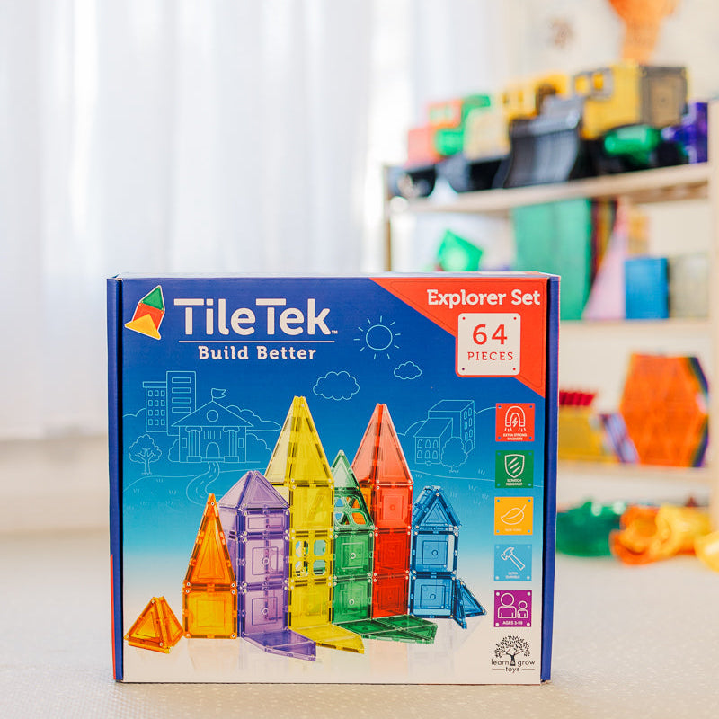 TileTek Explorer Set packaging with colorful building blocks on a shelf in the background