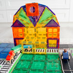 Colourful_station_made_from_learn_and_grow_magnetic_tiles_set_up_with_train_and_road_toppers