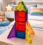 Colourful magnetic rocket on a table with a child's room in the background