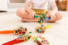 Load image into Gallery viewer, Colourful magnetic wands and metal rimmed counting chips used by children for sensory play

