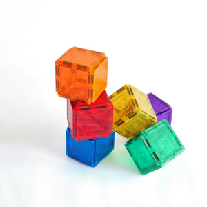 Small square magnetic tiles stacked as cubes